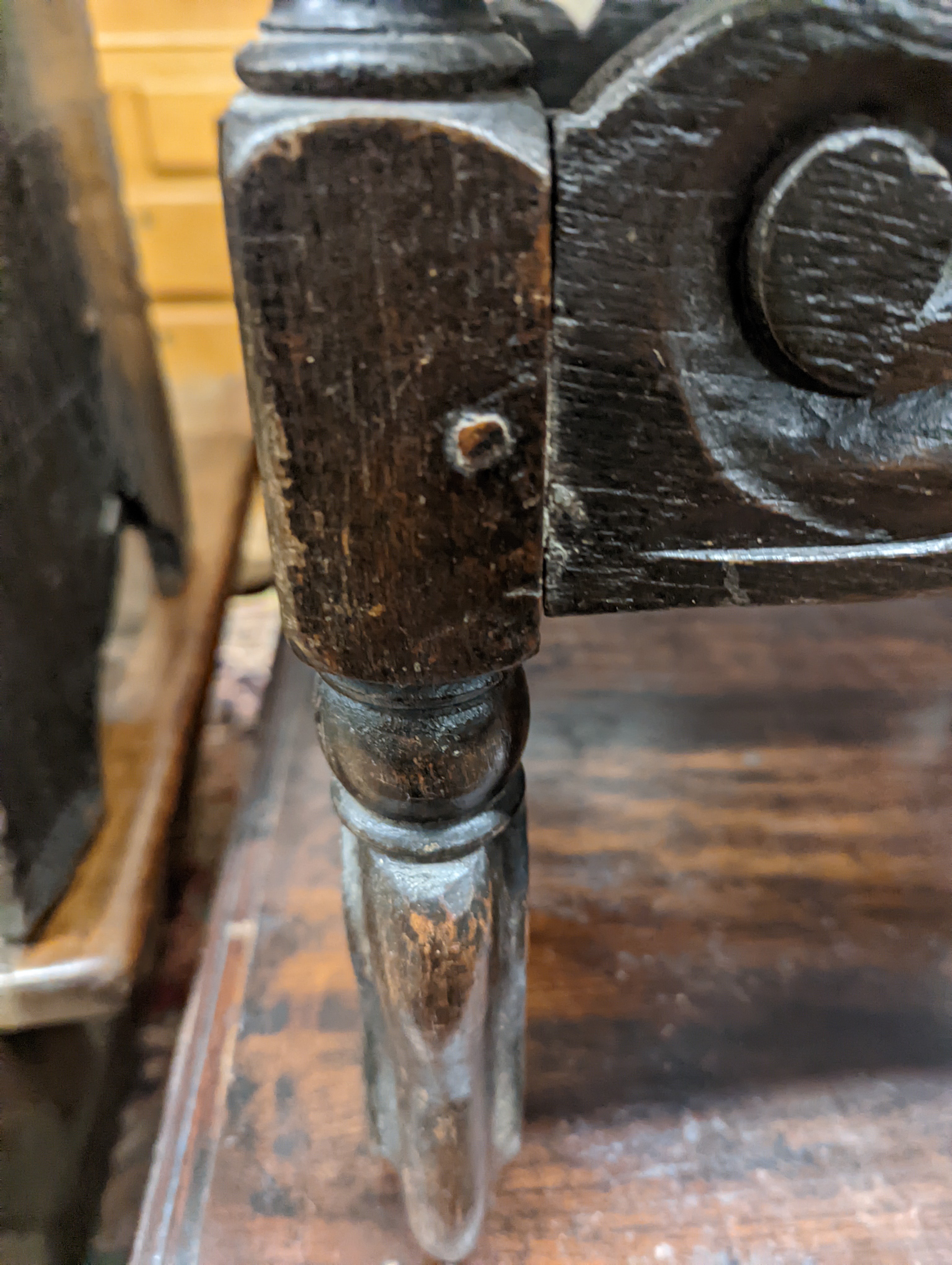 A 17th century style carved oak stool, with caned seat and H stretcher, width 47cm, depth 46cm, height 42cm